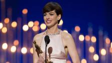 Anne Hathaway accepts her award for Best Actress in a Supporting Role at the Oscars on February 24, 2013.