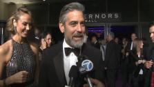 George Clooney talks to OTRC.com before entering the Governors Ball after the 2013 Oscars. - Provided courtesy of OTRC