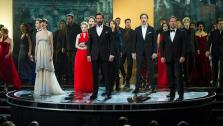 Aaron Tveit, Anne Hathaway, Amanda Seyfried, Eddie Redmayne, Hugh Jackman, Samantha Barks, Sacha Baron Cohen and Russell Crowe perform at the 2013 Oscars at the Dolby Theatre in Los Angeles on February 24.