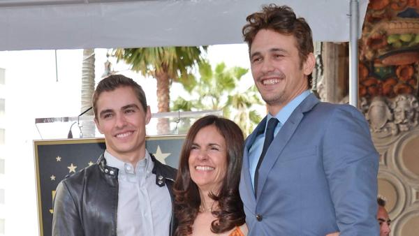 Actor James Franco (R), his brother Dave Franco (L) and his mother Betsy Franco (C) attend a ceremony honoring James Franco with a star on The Hollywood Walk of Fame on March 7, 2013 in Hollywood, California. - Provided courtesy of Alberto E. Rodriguez/WireImage