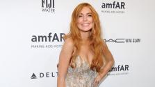  Lindsay Lohan attends amfARs New York gala at Cipriani Wall Street on Wednesday, Feb. 6, 2013 in New York. - Provided courtesy of Evan Agostini / Invision / AP