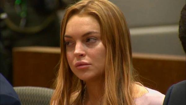 Lindsay Lohan appears at a Los Angeles court on March 18, 2013 at a trial over a 2012 car crash case.
