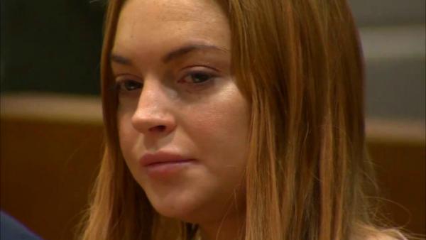 Lindsay Lohan appears at a Los Angeles court on March 18, 2013 at a trial over a 2012 car crash case.