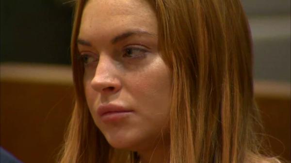 Lindsay Lohan appears at a Los Angeles court on March 18, 2013 at a trial over a 2012 car crash case.
