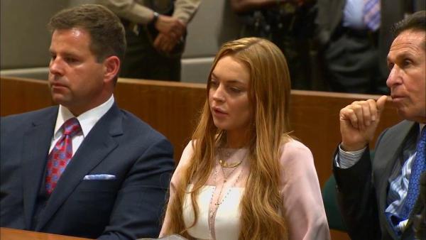 Lindsay Lohan appears at a Los Angeles court on March 18, 2013 at a trial over a 2012 car crash case.