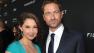 Ashley Judd and Gerard Butler pose at the LA premiere of 'Olympus Has Fallen' at the ArcLight Theatre on Monday, March 18, 2013 in Los Angeles.