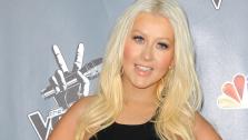 Christina Aguilera arrives at the 4th season premiere screening of The Voice at the TCL Theatre on Wednesday, March 20, 2013 in Los Angeles. - Provided courtesy of AP / Jordan Strauss