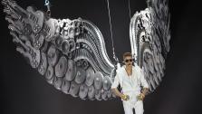 Justin Bieber appears in a photo with fan Millie Smith, which he re-Tweeted from another Twitter user on Jan. 6, 2013. - Provided courtesy of AP / Gero Breloer