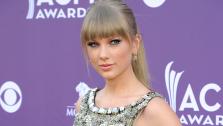 Singer Taylor Swift arrives at the 48th Annual Academy of Country Music Awards at the MGM Grand Garden Arena in Las Vegas on Sunday, April 7, 2013. - Provided courtesy of AP