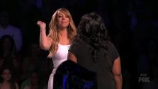 Mariah Carey glitter-bombs Candice Glover on the FOX show American Idol on April 10, 2013. - Provided courtesy of FOX