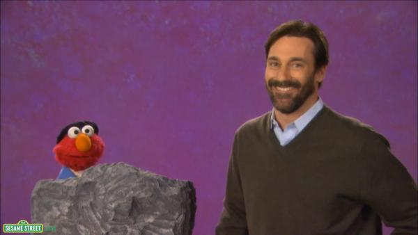 Jon Hamm and Elmo in a still from a YouTube clip of Sesame Street which was released on April 16, 2013. - Provided courtesy of PBS