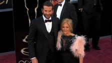Bradley Cooper walks the red carpet with his mother at the 2013 Oscars on Sunday, Feb. 24. - Provided courtesy of OTRC