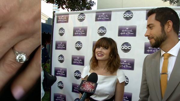 Alexis Bledel, wearing a new engagement ring from fiance Vincent Kartheiser, and Zachary Levi talks to OTRC.com at the premiere of the Hallmark TV film Remember Sunday in Los Angeles on April 17, 2013. - Provided courtesy of OTRC