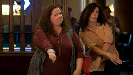 Sandra Bullock and Melissa McCarthy appear in a scene from the 2013 movie The Heat. Bullock plays an FBI agent and McCarthy plays a foul-mouthed Boston cop. They team up to try to nab a ruthless drug lord.