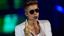 Justin Bieber performs in Berlin, Germany during his Believe tour on March 31, 2013. - Provided courtesy of AP Photo / Gero Breloer