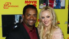 Alfonso Ribeiro, left, and Angela Unkrich attend the premiere of Movie 43 in Los Angeles on Wednesday, Jan. 23, 2013. - Provided courtesy of Matt Sayles / Invision / AP
