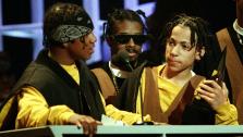The rap duo Kris Kross is shown at the American Music Awards presentation as they accept their award in Los Angeles on January 25, 1993. - Provided courtesy of AP / AP Photo/Mark Terrill