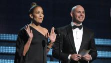 Jennifer Lopez, left, and Pitbull present the award for best pop solo performance at the 55th annual Grammy Awards on Sunday, Feb. 10, 2013, in Los Angeles. - Provided courtesy of John Shearer/Invision/AP