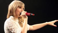 Taylor Swift performs onstage during her Red Tour at the Verizon Center on Saturday, May 11, 2013, in Washington D.C. - Provided courtesy of Owen Sweeney/Invision/AP