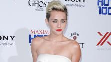 Singer and actress Miley Cyrus arrives at the 2013 Maxim Hot 100 celebration at Vanguard on Wednesday, May 15, 2013 in Los Angeles. - Provided courtesy of AP / Dan Steinberg/Invision/AP