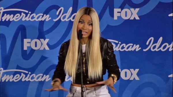 Nicki Minaj talks to reporters backstage after the American Idol season 12 finale on May 16, 2013. Candice Glover beat Kree Harrison for the title. - Provided courtesy of FOX