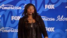 Candice Glover talks to reporters backstage after the American Idol season 12 finale on May 16, 2013. She beat Kree Harrison to win the title. - Provided courtesy of none / FOX