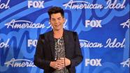 Former finalist and glam rocker Adam Lambert talks to reporters backstage after the American Idol season 12 finale on May 16, 2013. Candice Glover beat Kree Harrison to win the title. - Provided courtesy of none / FOX