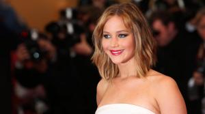 Actress Jennifer Lawrence poses for photographers as she arrives on the red carpet for the screening of the film Jimmy P. Psychotherapy of a Plains Indian at the 66th international film festival, in Cannes, southern France, Saturday, May 18, 2013. - Provided courtesy of Joel Ryan/Invision/AP
