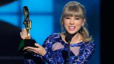 Taylor Swift accepts the award for top Billboard 200 album for Red at the Billboard Music Awards at the MGM Grand Garden Arena on Sunday, May 19, 2013 in Las Vegas. - Provided courtesy of Chris Pizzello/Invision/AP