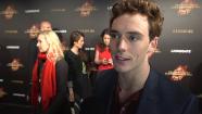 Sam Claflin talks about The Hunger Games: Catching Fire at the 2013 Cannes Film Festival on May 18, 2013. - Provided courtesy of none / Lionsgate