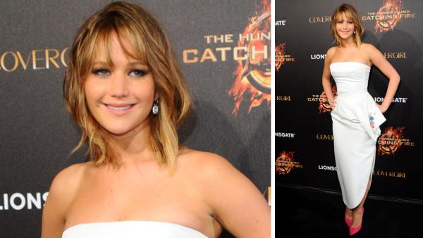 Actress Jennifer Lawrence poses for photographers at the Hunger Games Party in Cannes, southern France, Saturday May 18, 2013. - Provided courtesy of AP Photos/Anthony Harvey