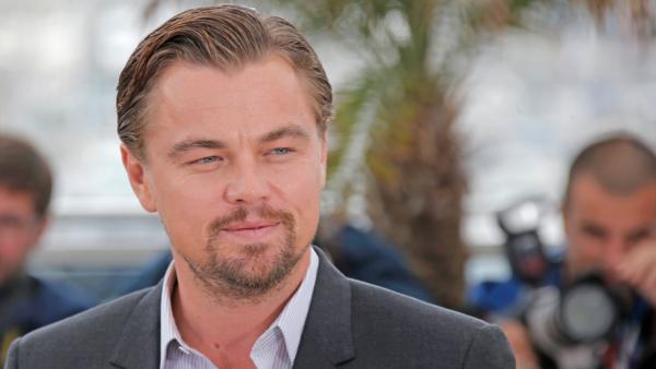 Actor Leonardo DiCaprio poses for photographers during a photo call for The Great Gatsby at the 66th international film festival, in Cannes, southern France, Wednesday, May 15, 2013. - Provided courtesy of AP Photo/Lionel Cironneau