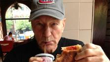 Patrick Stewart appears in a photo posted on his Twitter page on May 29, 2013. He is seen holding a slice of pizza. He later explained that it ws the first time he had ordered a pizza by the slice. - Provided courtesy of twitter.com/SirPatStew/status/339786117530415104