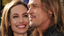 Cast member Brad Pitt and fiancee Angelina Jolie attend the world premiere of World War Z at the Empire Cinema Leicester Square in London on June 2, 2013. - Provided courtesy of Stuart C. Wilson / Getty Images for Paramount Pictures International)