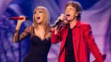 Special guest Taylor Swift and Mick Jagger of the Rolling Stones perform at the United Center on Monday, June 3, 2013 in Chicago. - Provided courtesy of Barry Brecheisen/Invision/AP