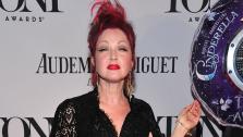 Cyndi Lauper arrives on the red carpet at the 67th Annual Tony Awards, on Sunday, June 9, 2013. - Provided courtesy of AP Invision / Charles Sykes