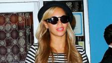 Singer Beyonce appears in photos posted on her official website, iam.beyonce.com. - Provided courtesy of iam.beyonce.com