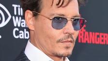 Johnny Depp appears at the premiere of The Lone Ranger in Disneylands California Adventure Park on June 22, 2013. - Provided courtesy of Christopher Polk / WireImage / Walt Disney Company
