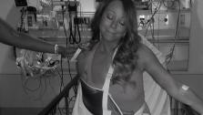 Mariah Carey posted this photo on her Twitter and Facebook pages on July 9, 2013. She is seen sporting a sling. Her husband, Nick Cannon, said she suffered a shoulder injury and cracked a rib after falling off of a platform on the set of a music video. - Provided courtesy of twitter.com/MariahCarey/status/354634720228806658/photo/1