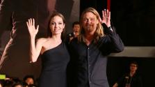 Angelina Jolie and partner and cast member Brad Pitt attend the World War Z premiere at Roppongi Hills in Tokyo, Japan on July 29, 2013. - Provided courtesy of Ken Ishii / Getty Images for Paramount Pictures