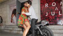 Orlando Bloom and Condola Rashad, stars of the upcoming Broadway production of Romeo and Juliet, kiss on a motorcycle in New York on Aug. 7, 2013. They had just arrived at the shows new home, the Richard Rodgers Theatre, for the first time. - Provided courtesy of Amanda Schwab / Startraksphoto.com