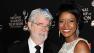 George Lucas and then-fiance Mellody Hobson attend the 40th annual Daytime Emmy Awards in Beverly Hills, California on June 16, 2013. They wed six days later. On Aug. 9, they welcomed their first child together, a baby girl.