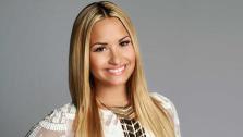 Demi Lovato appears in a promotional photo for FOXs The X Factor. - Provided courtesy of Nino Munoz / FOX