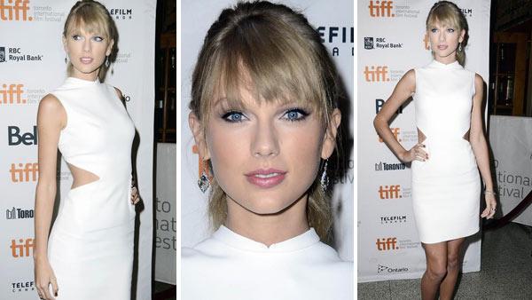 Taylor Swift rocks a sexy white Calvin Klein dress at the Toronto International Film Festival premiere of One Chance on Sept. 9, 2013. - Provided courtesy of Christian Lapid / Startraksphoto.com Taylor Swift rocks a sexy white Calvin Klein dress at the Toronto International Film Festival premiere of One Chance on Sept. 9, 2013. - Provided courtesy of Christian Lapid / Startraksphoto.com