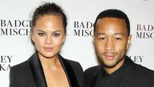 John Legend and Chrissy Teigen appear at the Badgley Mischka show during Spring 2014 Mercedes-Benz Fashion Week in New York City on Sept. 10, 2013. - Provided courtesy of Marion Curtis / startraksphoto.com