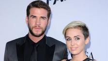 Miley Cyrus and Liam Hemsworth appear at the Los Angeles premiere of Paranoia on Aug. 8, 2013. - Provided courtesy of Sara De Boer / Startraksphoto.com