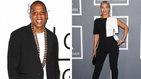 Jay-Z appears at the Jay-Z and Samsung release party for Magna Carta Holy Grail in New York City on July 3, 2013. Beyonce appears at the 55th annual GRAMMY awards in Los Angeles, California on Feb. 10, 2013.