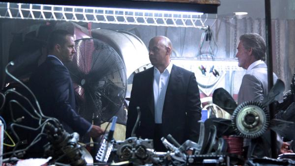 Vin Diesel, Kurt Russell and Paul Walker appear in a photo from the set of Fast and Furious 7 posted on Diesels Facebook page on Sept. 24, 2013. - Provided courtesy of OTRC