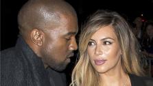 Kim Kardashian and Kanye West attend the Givenchy Spring/Summer 2014 Ready-To-Wear Collection fashion show during Paris Fashion Week in Paris, France on Sept. 29, 2013. - Provided courtesy of Nicolas Genin / Abaca / Startraksphoto.com