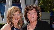 Dot-Marie Jones, who plays Coach Beiste on Glee, and Bridgett Casteen attend the 2013 Creative Arts Emmy Awards in Los Angeles on Sept. 15, 2013. The two got engaged on Oct. 4. - Provided courtesy of Lionel Hahn / Abacausa / Startraksphoto.com